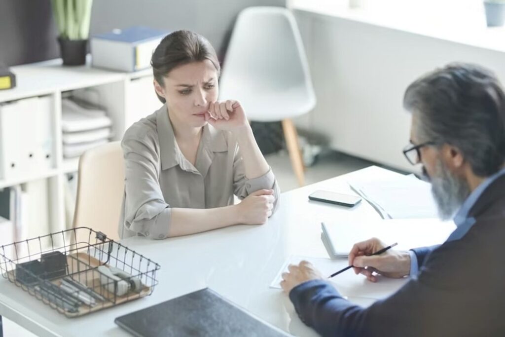 A woman obtaining the services of an experienced criminal defense lawyer